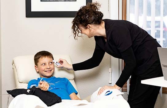 Child getting medical transfusion