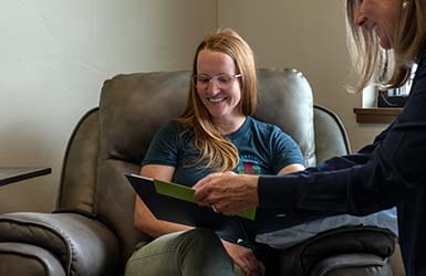 Infusion patient being helped