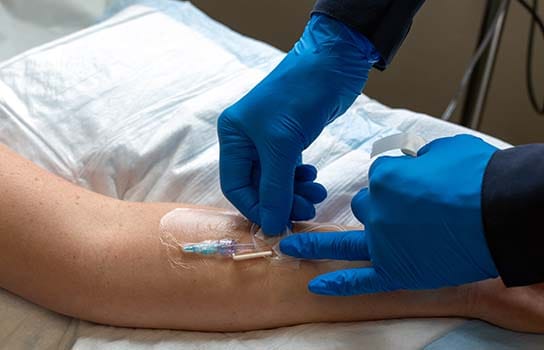 Medical Infusion close up of needle insertion